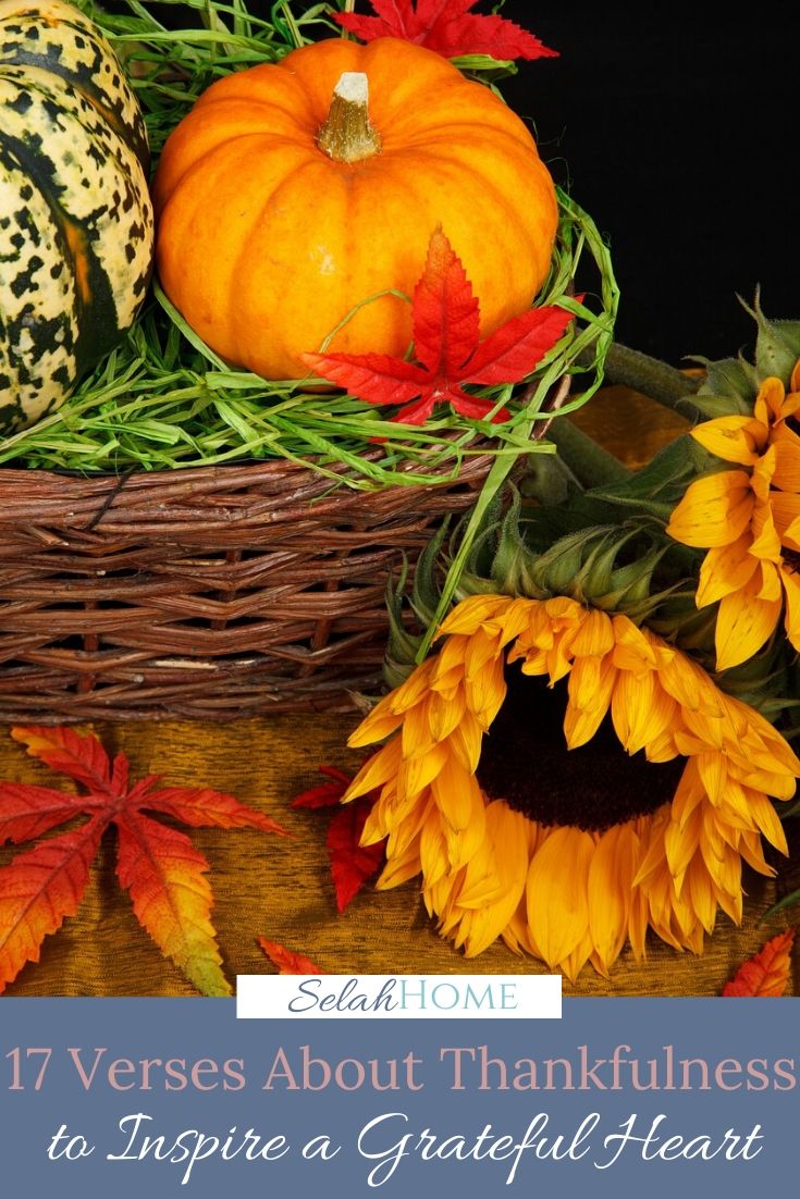 A Pinterest pin with a picture of pumpkins in a basket, fall leaves, and sunflowers. Designed for this post of verses about thankfulness.