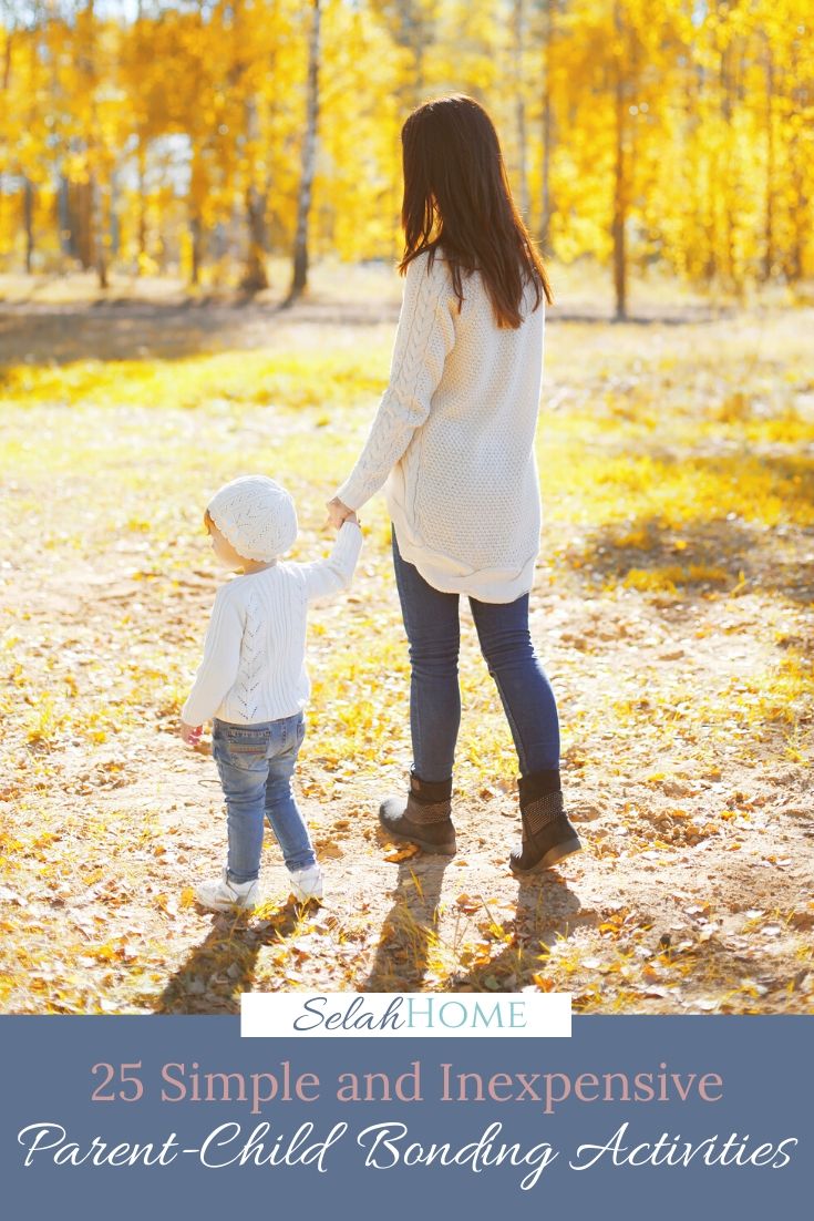 A Pinterest pin with a picture of a woman and small child walking through a field. Designed for this post about simple and inexpensive parent and child bonding activities.