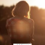 A Pinterest pin with a picture of a discouraged woman at sunset. Designed for this post about hope for the struggling mom.