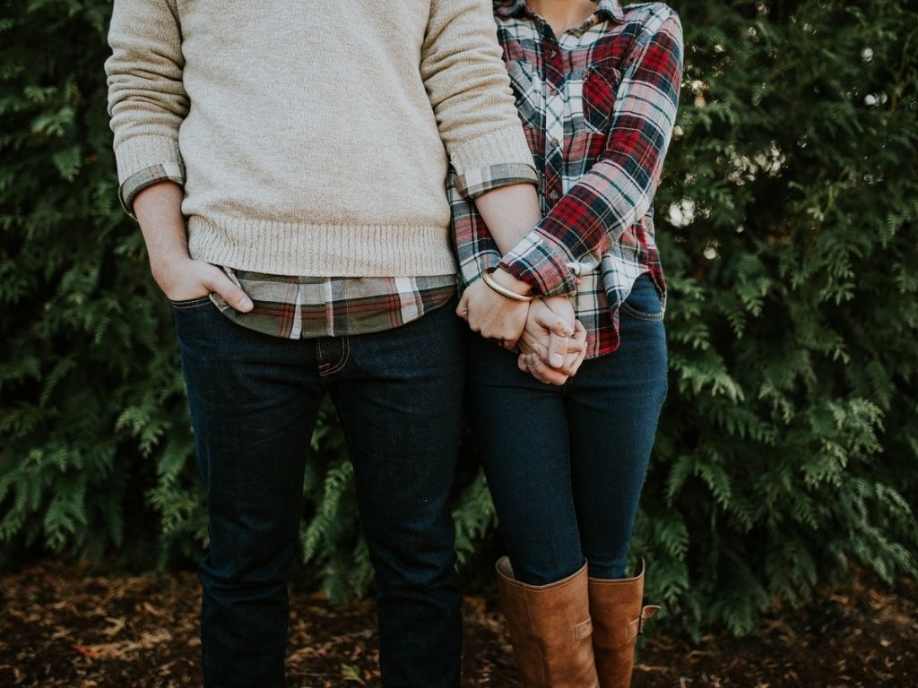 A picture of a couple holding hands for this post about how to keep a strong marriage.
