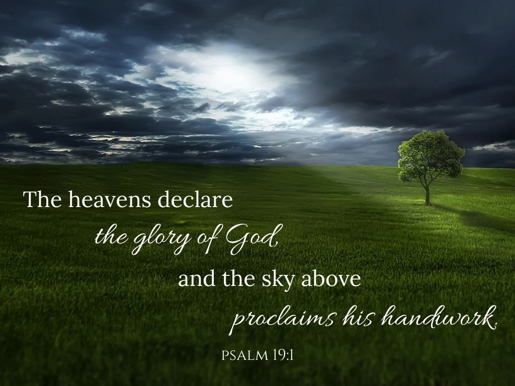 A picture of sunlight filtering through the clouds for this post of verses about connecting with God through nature.
