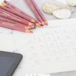 A Pinterest pin with a picture of a calendar, to-do list, and pencils . Designed for this post about a list of chores for kids.
