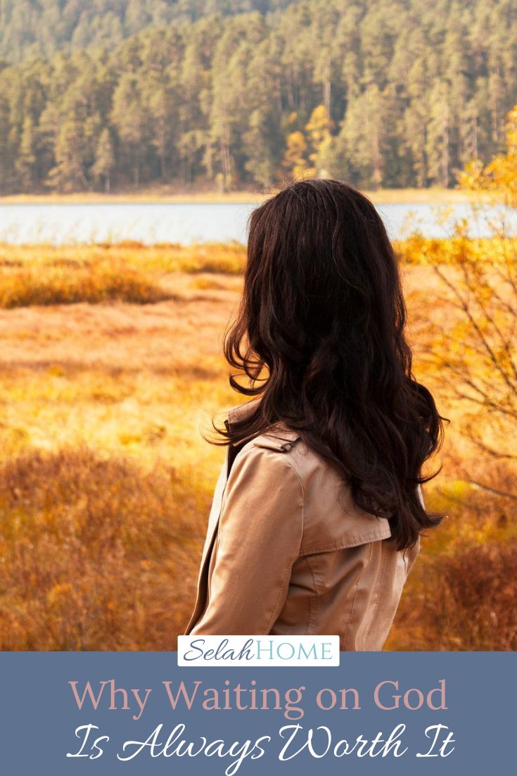 A Pinterest pin with a picture of a woman looking out over an open field. Designed for this post about waiting on God.