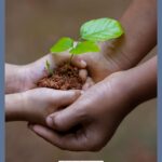 A Pinterest pin with a picture of one person giving a plant to another person. Designed for this post of bible verses about giving.