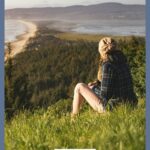A Pinterest pin with a picture of a woman sitting and thinking. Designed for this post about how to keep your faith strong through disappointment.