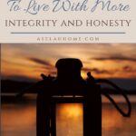 A Pinterest pin with a picture of a lantern by the water. Designed for this post about how to live with integrity.