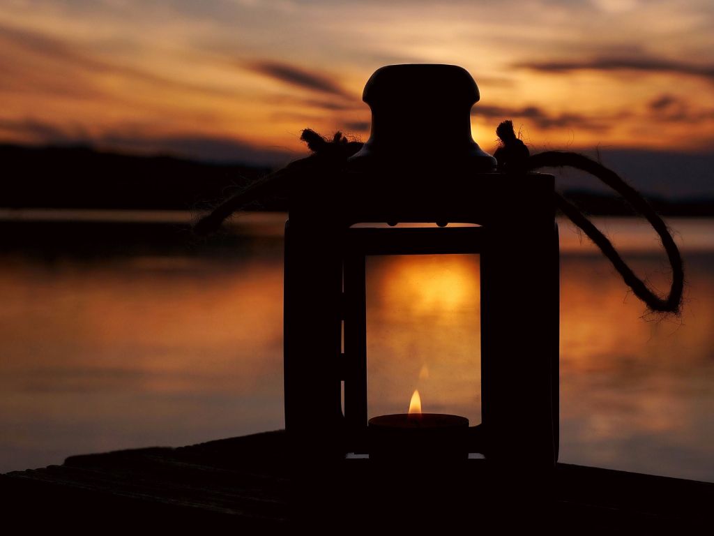 A picture of a lantern by the water for this post about how to live with integrity.