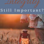 A Pinterest pin with a picture of a woman carrying a lantern. Designed for this post about why integrity is important.