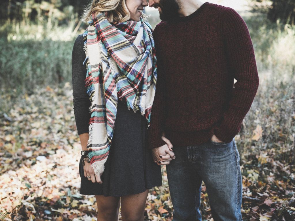 A picture of a couple holding hands for this post of strong marriage quotes.